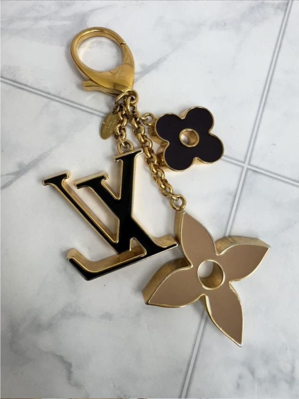 Louis Vuitton Gold-Tone LV Logo & Beige Black Flower Charm Key Holder